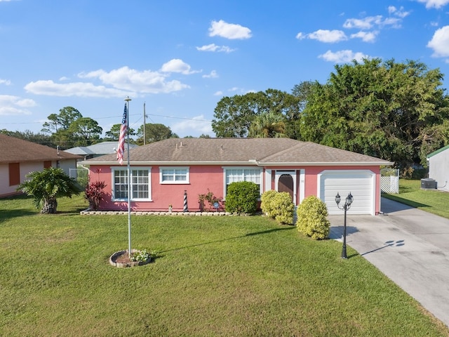 single story home featuring a garage, central AC unit, and a front lawn