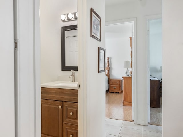 bathroom with vanity and wood-type flooring