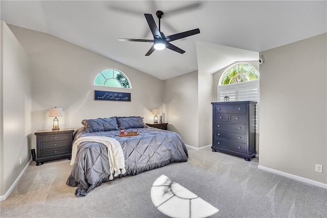 carpeted bedroom with lofted ceiling and ceiling fan