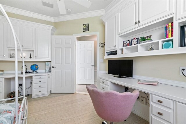 728 S Ocracoke Sq SW, Vero Beach, FL 32968 - office space with built in study area, ornamental molding, light wood-style flooring, a ceiling fan, and wainscoting
