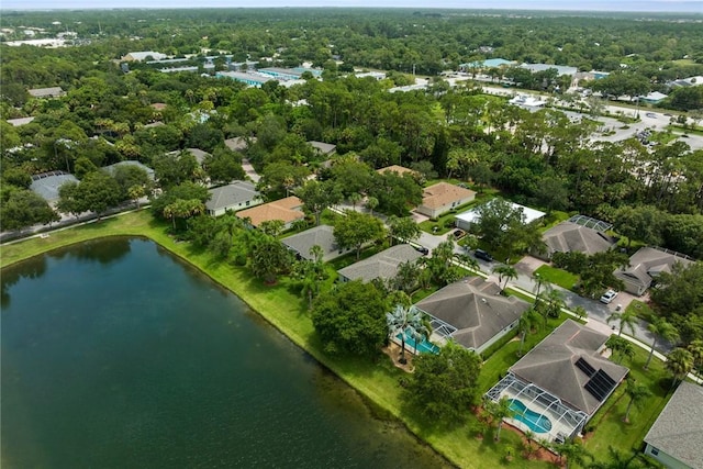728 S Ocracoke Sq SW, Vero Beach, FL 32968 - aerial view of property's location featuring a large body of water and nearby suburban area