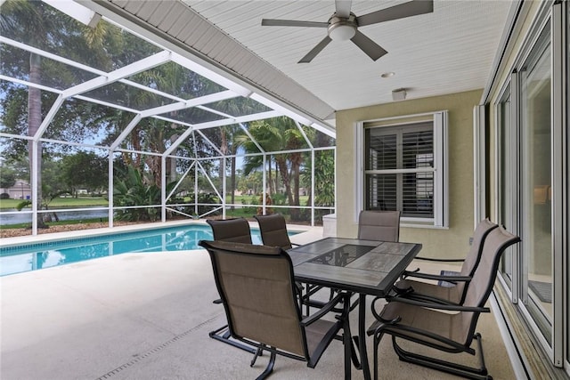 728 S Ocracoke Sq SW, Vero Beach, FL 32968 - outdoor pool with a patio, a ceiling fan, and glass enclosure