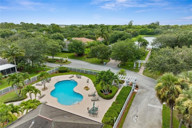 728 S Ocracoke Sq SW, Vero Beach, FL 32968 - drone / aerial view of a pool and a nearby body of water