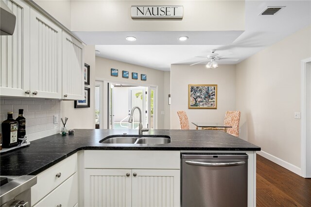 2139 Via Fuentes St Unit 2139, Vero Beach, FL 32963 - kitchen featuring stainless steel dishwasher, a peninsula, tasteful backsplash, ceiling fan, and dark wood finished floors