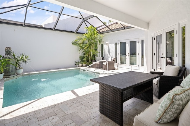 2139 Via Fuentes St Unit 2139, Vero Beach, FL 32963 - swimming pool with french doors, outdoor lounge area, a patio area, and glass enclosure