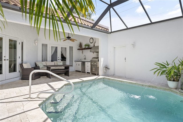2139 Via Fuentes St Unit 2139, Vero Beach, FL 32963 - swimming pool with french doors, ceiling fan, a patio area, area for grilling, and a lanai