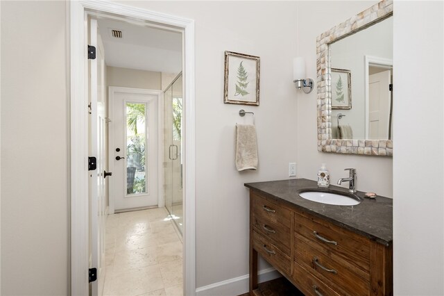 2139 Via Fuentes St Unit 2139, Vero Beach, FL 32963 - bathroom featuring vanity and a shower stall