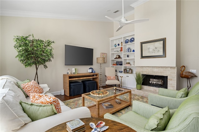 2139 Via Fuentes St Unit 2139, Vero Beach, FL 32963 - living room featuring ornamental molding, wood finished floors, ceiling fan, and a fireplace
