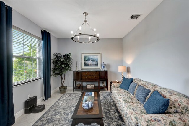 living room featuring a chandelier