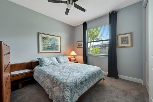 bedroom with carpet flooring, ceiling fan, and a closet