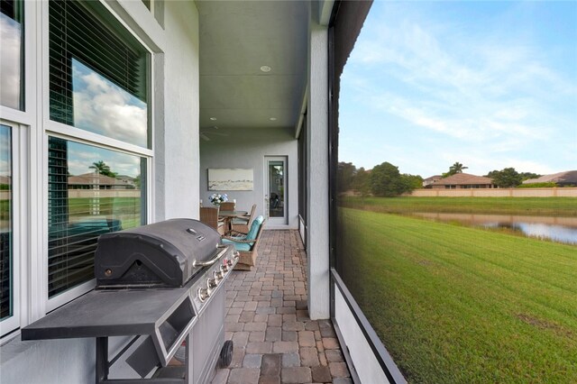 view of patio / terrace featuring a water view