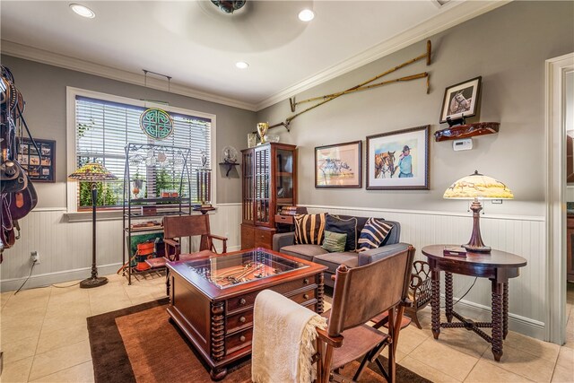 living area featuring a wainscoted wall, recessed lighting, light tile patterned flooring, and crown molding