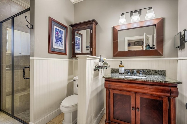 455 74th Ave, Vero Beach, FL 32968 - bathroom featuring a wainscoted wall, a shower stall, and vanity