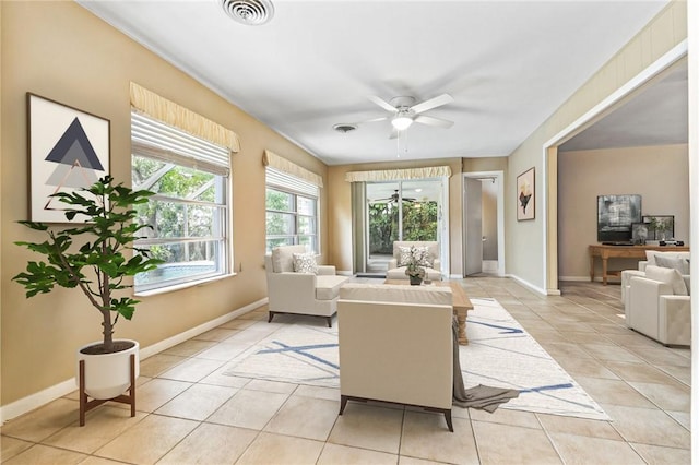 28 Sea Gull Ave, Vero Beach, FL 32960 - living room featuring visible vents, ceiling fan, and light tile patterned flooring