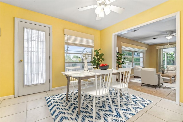 28 Sea Gull Ave, Vero Beach, FL 32960 - dining space featuring light tile patterned floors, baseboards, a ceiling fan, and visible vents