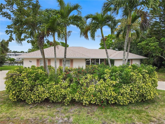 28 Sea Gull Ave, Vero Beach, FL 32960 - view of side of property featuring stucco siding