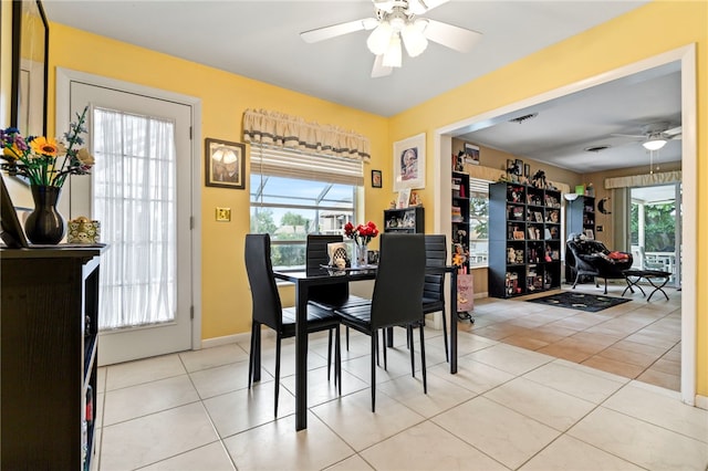28 Sea Gull Ave, Vero Beach, FL 32960 - tiled dining room featuring visible vents, ceiling fan, and plenty of natural light