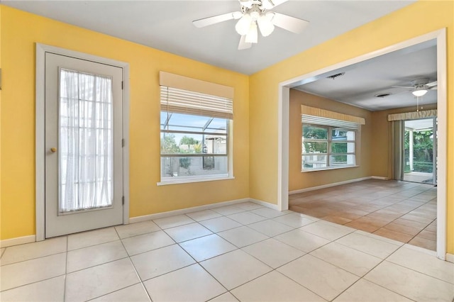 28 Sea Gull Ave, Vero Beach, FL 32960 - entryway featuring visible vents, ceiling fan, tile patterned flooring, and baseboards