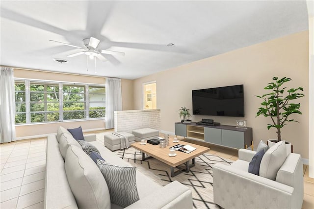 28 Sea Gull Ave, Vero Beach, FL 32960 - living area featuring baseboards, a ceiling fan, and visible vents