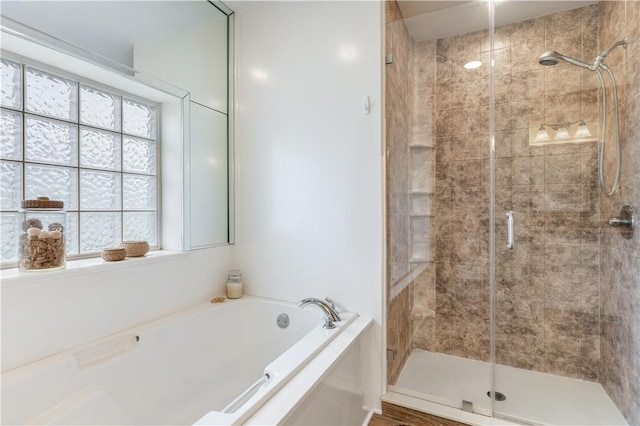 bathroom with independent shower and bath