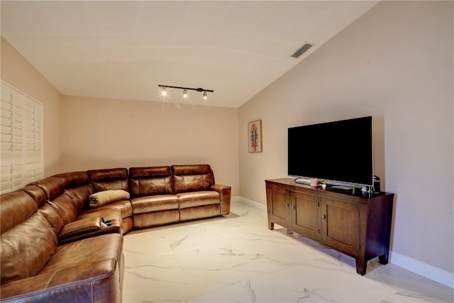 living room featuring lofted ceiling