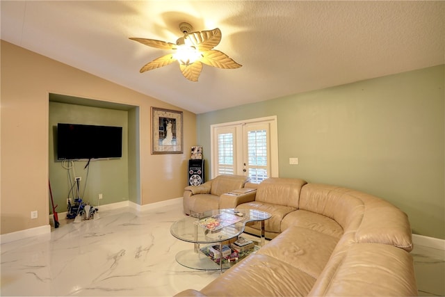 living room featuring french doors, ceiling fan, a textured ceiling, and lofted ceiling