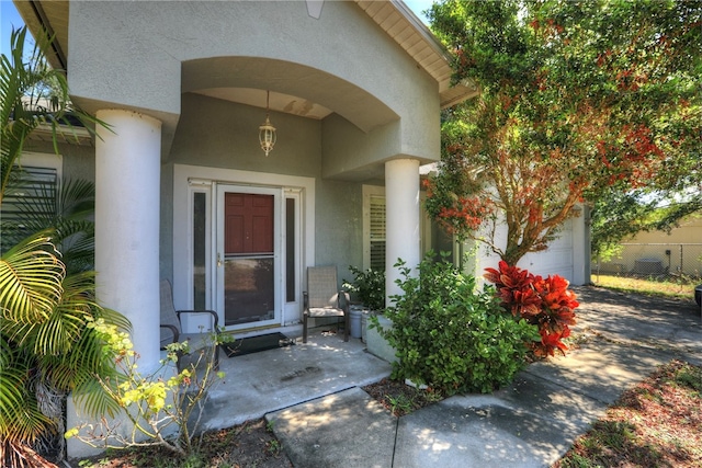 property entrance featuring a garage