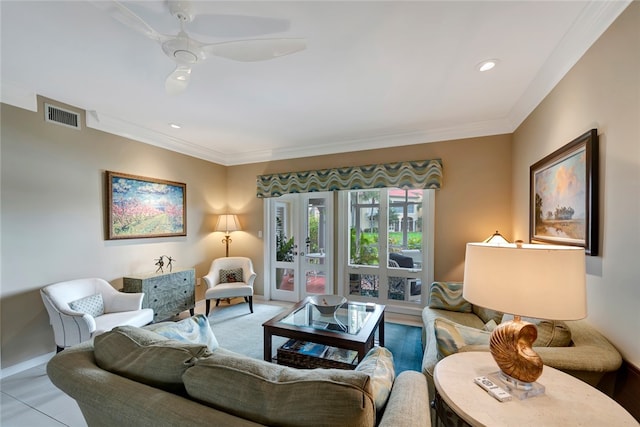 living room featuring light tile patterned flooring, french doors, ceiling fan, and crown molding