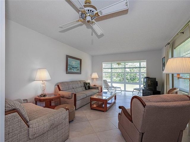 62 Woodland Dr Unit 201, Vero Beach, FL 32962 - living area with a ceiling fan and light tile patterned floors