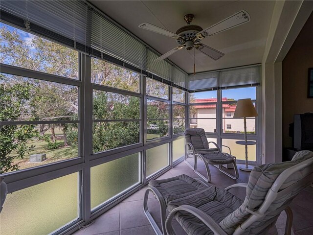 62 Woodland Dr Unit 201, Vero Beach, FL 32962 - sunroom with a ceiling fan