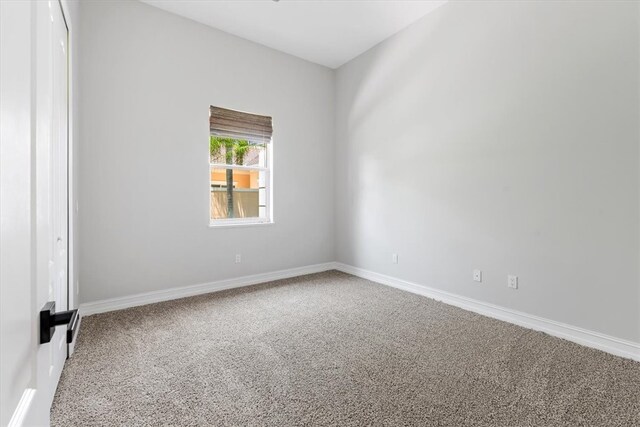 empty room with carpet floors