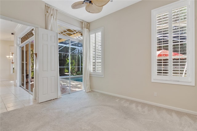 839 Island Club Sq, Vero Beach, FL 32963 - empty room with ceiling fan, carpet floors, and baseboards