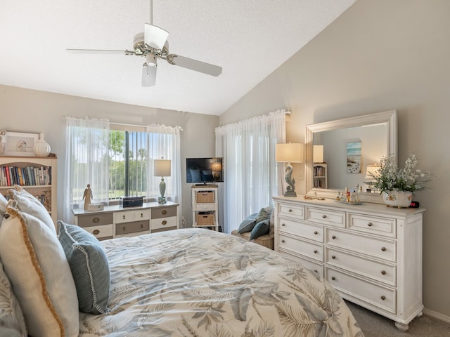 carpeted bedroom with a textured ceiling, high vaulted ceiling, and ceiling fan