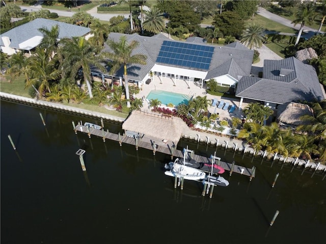 view of property location featuring a pool area and a large body of water