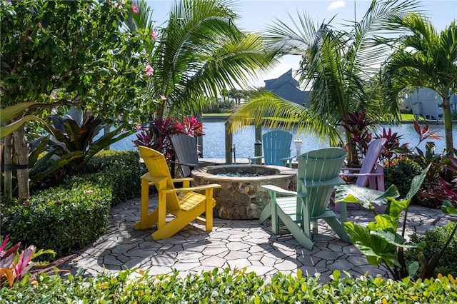 view of patio with a fire pit