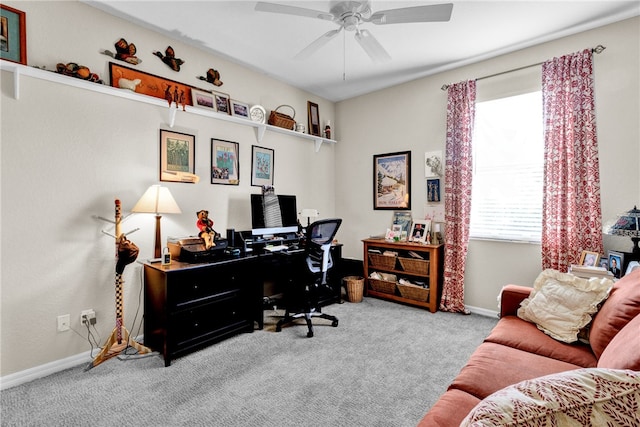 office space featuring light colored carpet and ceiling fan