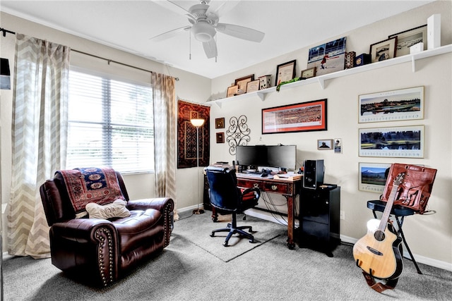 carpeted office with ceiling fan