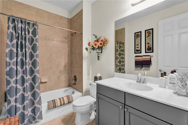 full bathroom with vanity, tile patterned flooring, shower / bathtub combination with curtain, and toilet