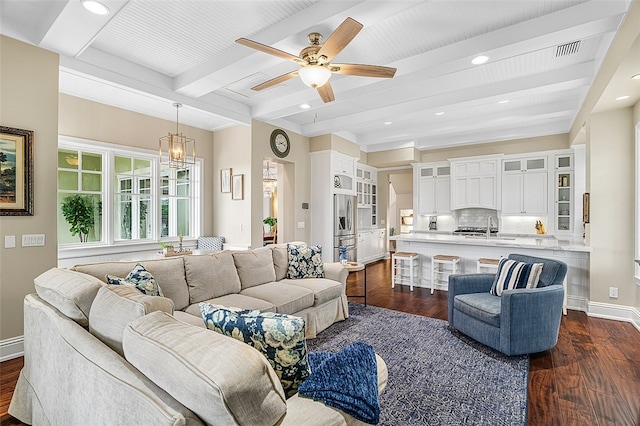 living room featuring beam ceiling, ceiling fan with notable chandelier, and dark hardwood / wood-style floors