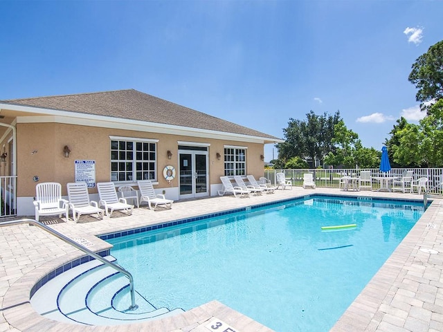 view of pool featuring a patio area