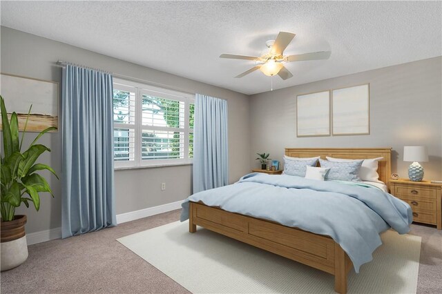 1901 Indian River Blvd Unit 202D, Vero Beach, FL 32960 - bedroom featuring light colored carpet, a textured ceiling, and a ceiling fan