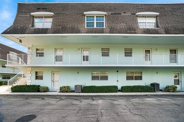 1901 Indian River Blvd Unit 202D, Vero Beach, FL 32960 - view of property with stairs
