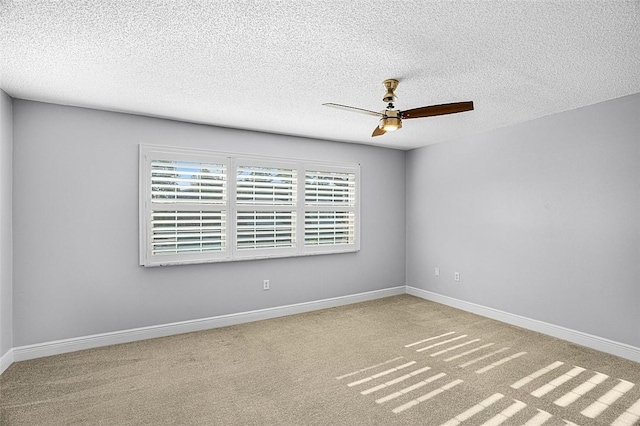 1901 Indian River Blvd Unit 202D, Vero Beach, FL 32960 - unfurnished room with ceiling fan, carpet floors, and a textured ceiling