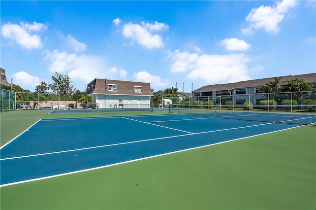 1901 Indian River Blvd Unit 202D, Vero Beach, FL 32960 - view of tennis court featuring community basketball court