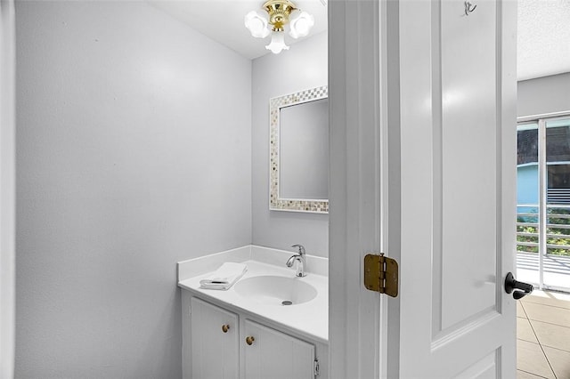 1901 Indian River Blvd Unit 202D, Vero Beach, FL 32960 - bathroom with vanity and tile patterned floors
