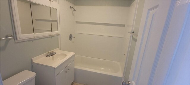 full bathroom featuring vanity,  shower combination, and toilet