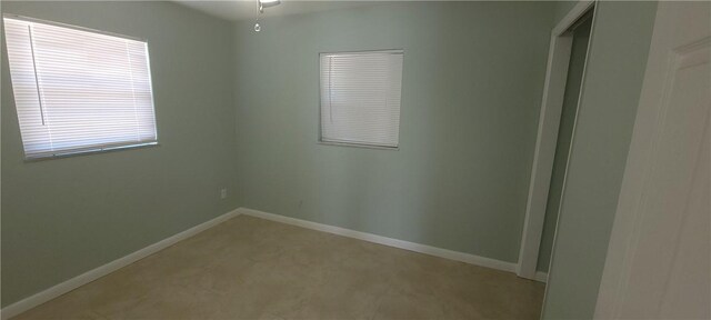 view of carpeted spare room