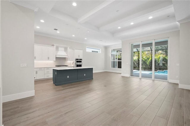 1820 Arawak St, Vero Beach, FL 32967 - kitchen featuring visible vents, crown molding, appliances with stainless steel finishes, a sink, and white cabinetry