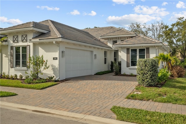 view of front of property featuring a garage