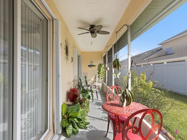 497 7th St, Vero Beach, FL 32962 - sunroom featuring ceiling fan and concrete floors